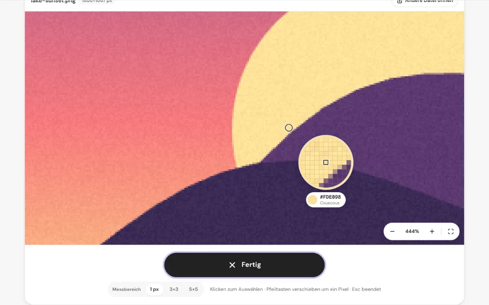 Die Lupe über einem vergrößerten Bild mit Pixelraster